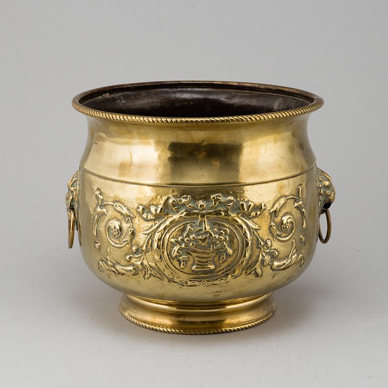 An 18th/19th century brass flower pot.