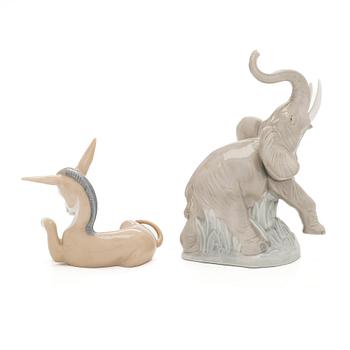 Lladró, two porcelain figurines, Donkey in Love and Trumpeting Elephant.