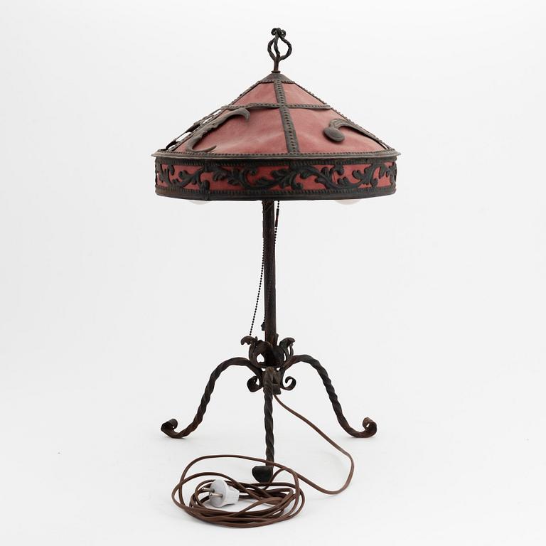 A wrought iron table light, 1920's.