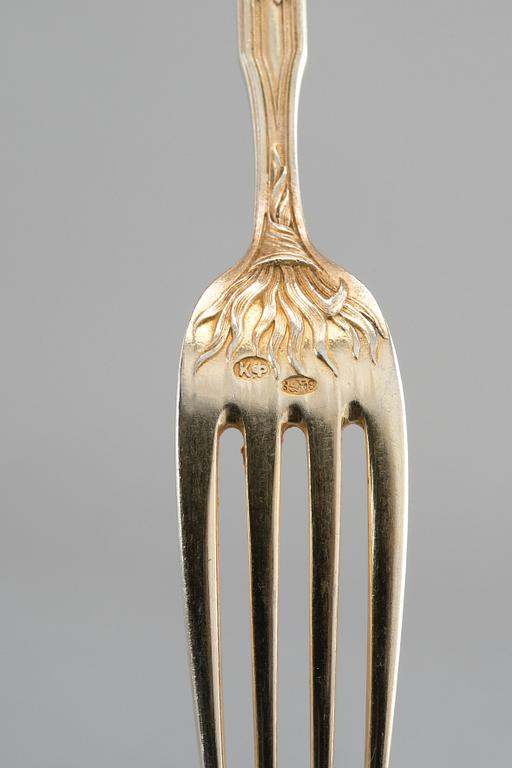 A SET OF CUTLERY, Fabergé 36 pcs. 84 gilt silver. Moscow 1890 s. Total weight 2695 g.