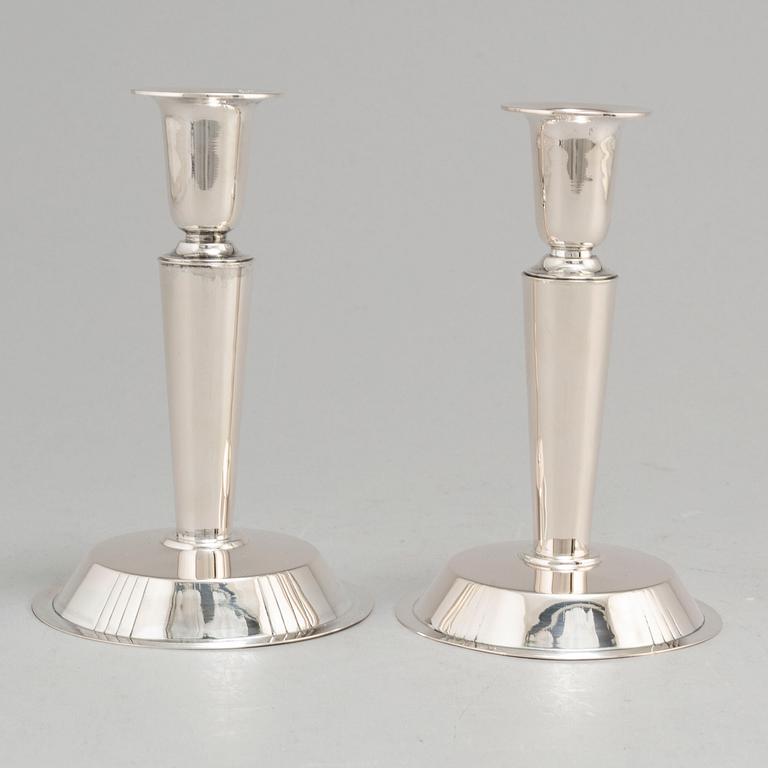 ERIC RÅSTRÖM, a pair of silver candlesticks, Stockholm 1954.