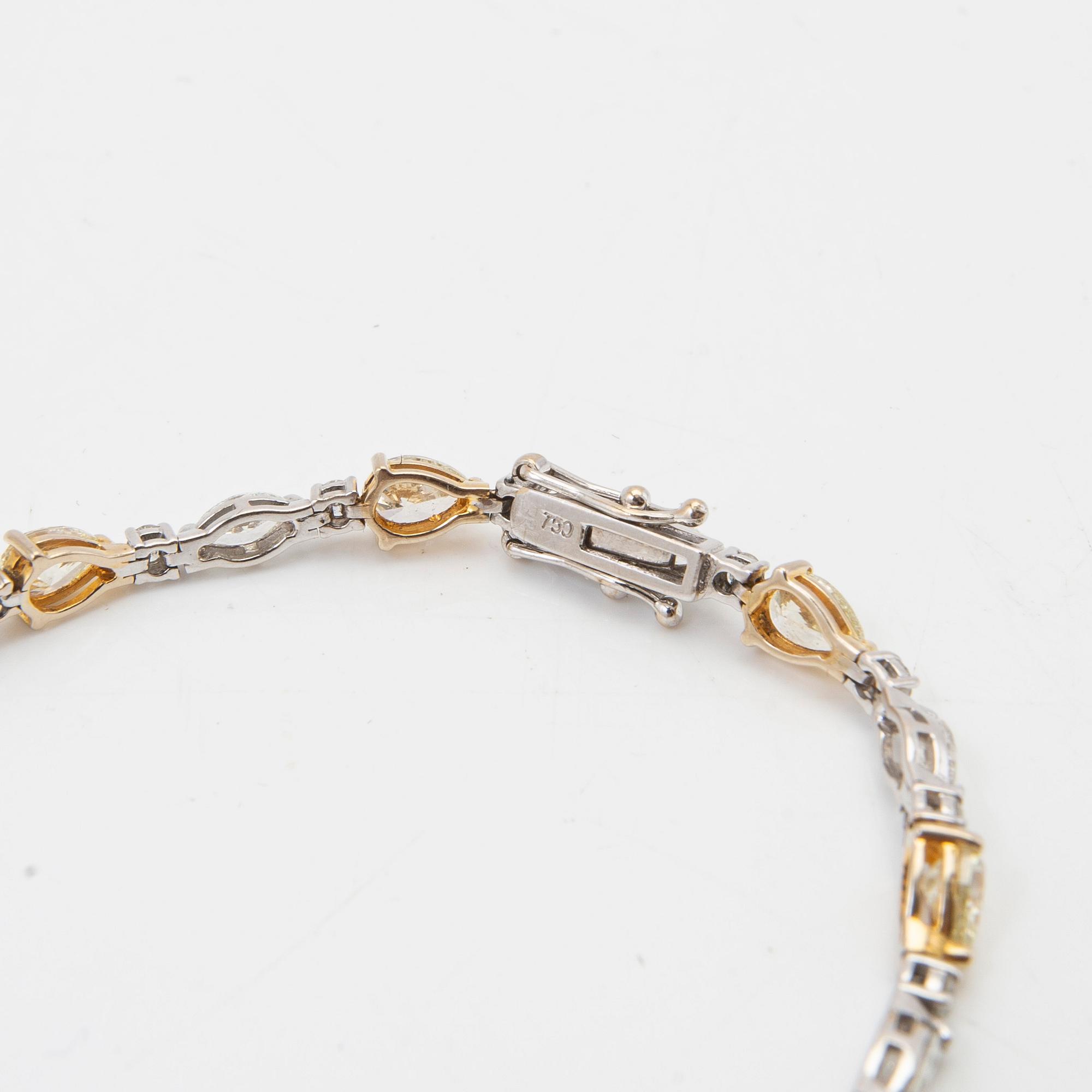 Armband, 18 k guld och vitguld med briljanter.