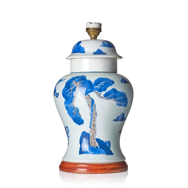 An iron red and blue 'horse' vase, Qing dynasty, 17th century.