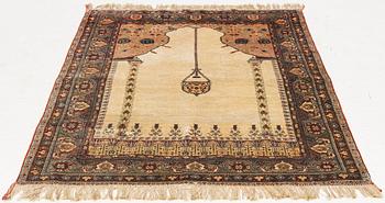 A semi-antique silk rug, probably Tabriz, c 164 x 110 cm,.