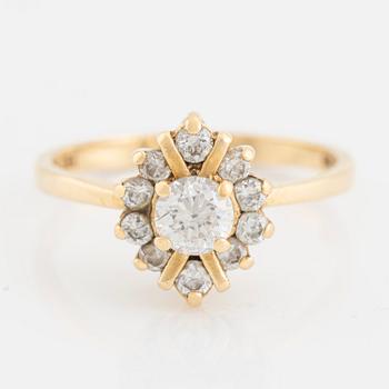 Ring, 18K gold with faceted white stones.