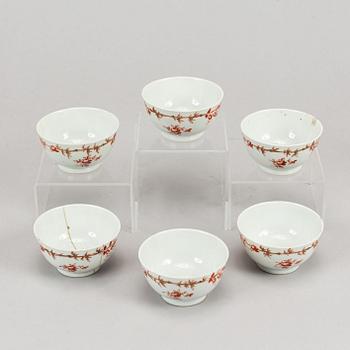 Nine orange and white export porcelain service, Qing dynasty, 18th-19th century.