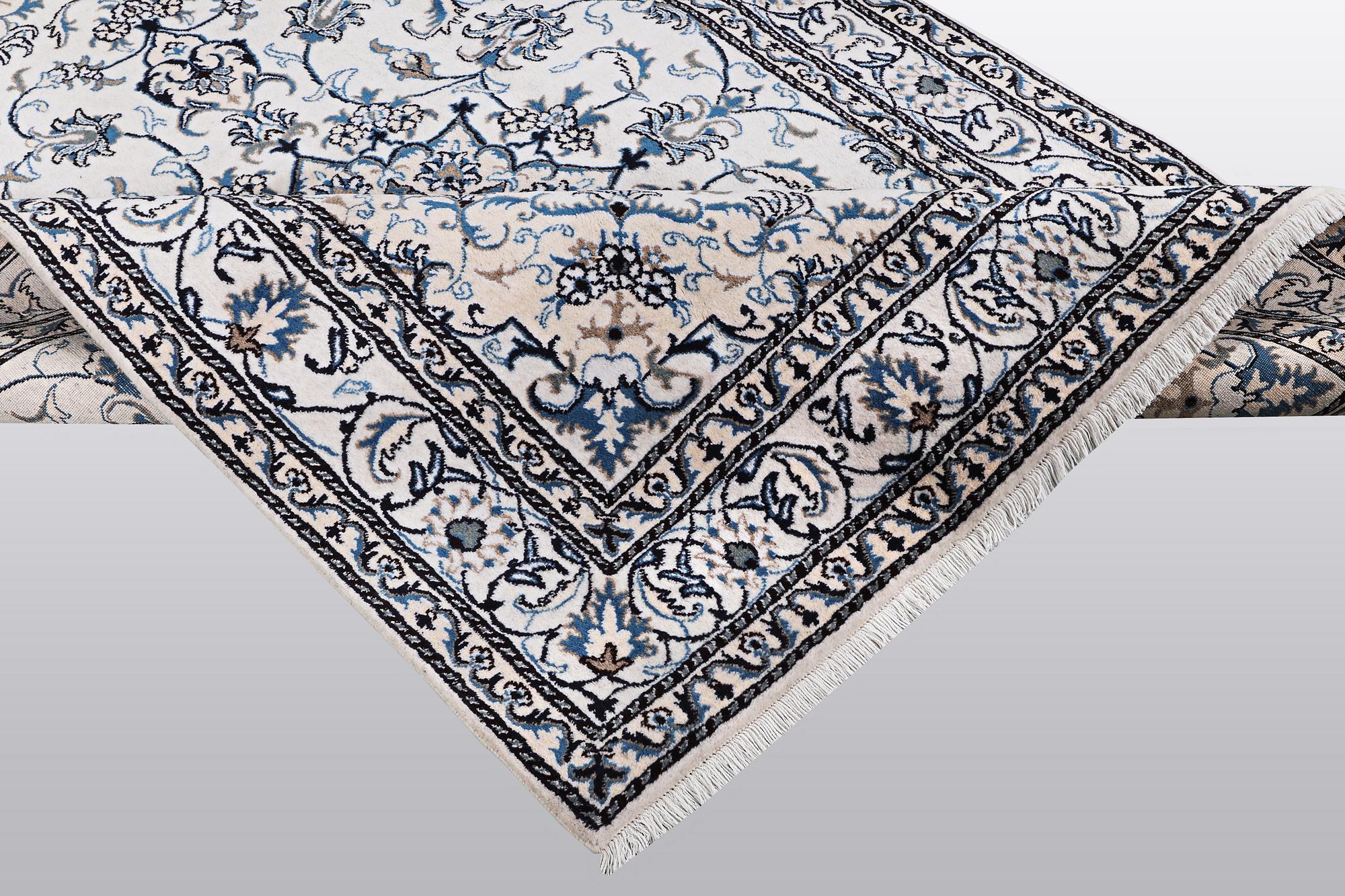 A rug, Nain, part silk, so called 9 LAA, ca 233 x 164 cm.