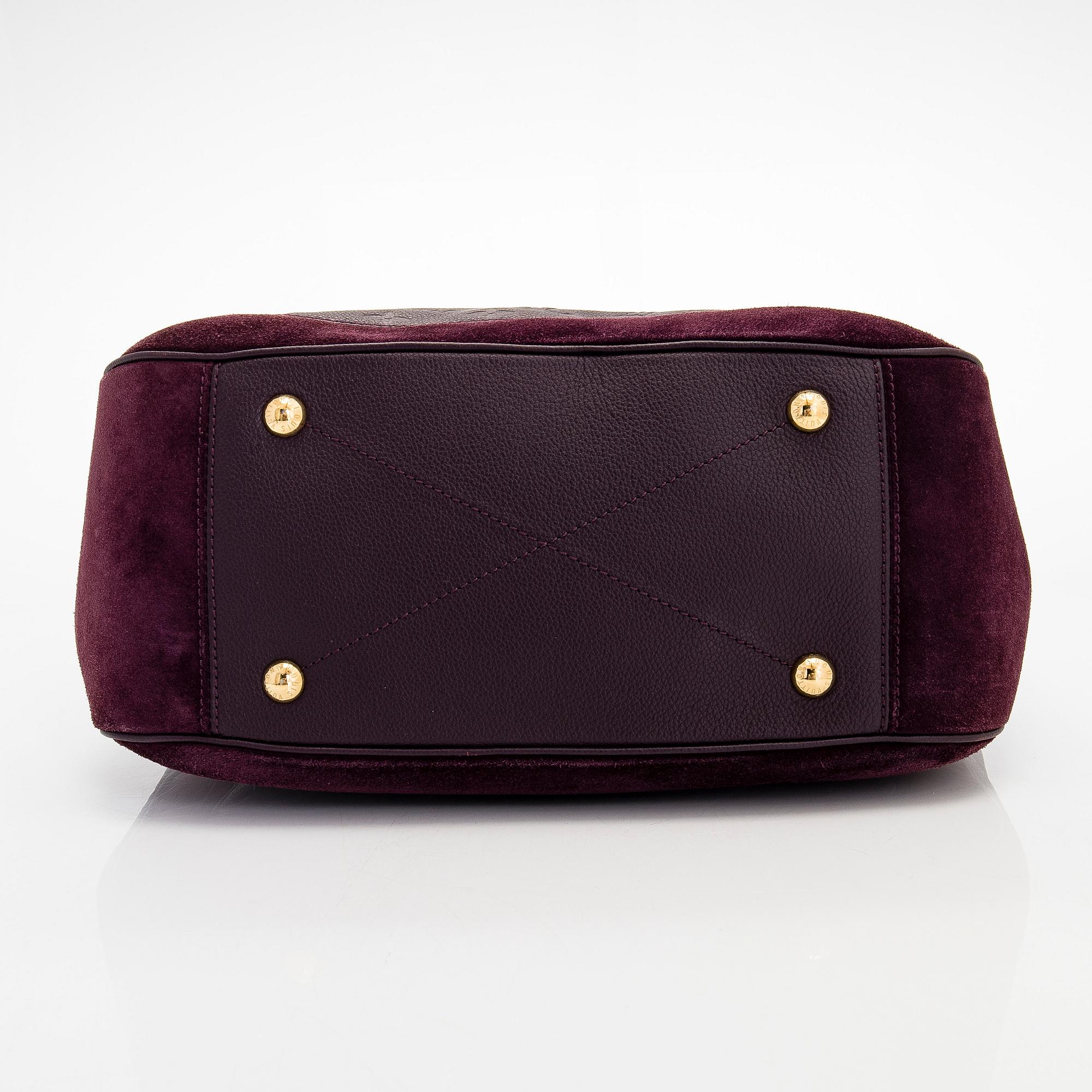 Louis Vuitton, a Monogram Empreinte 'Audacieuse' bag.