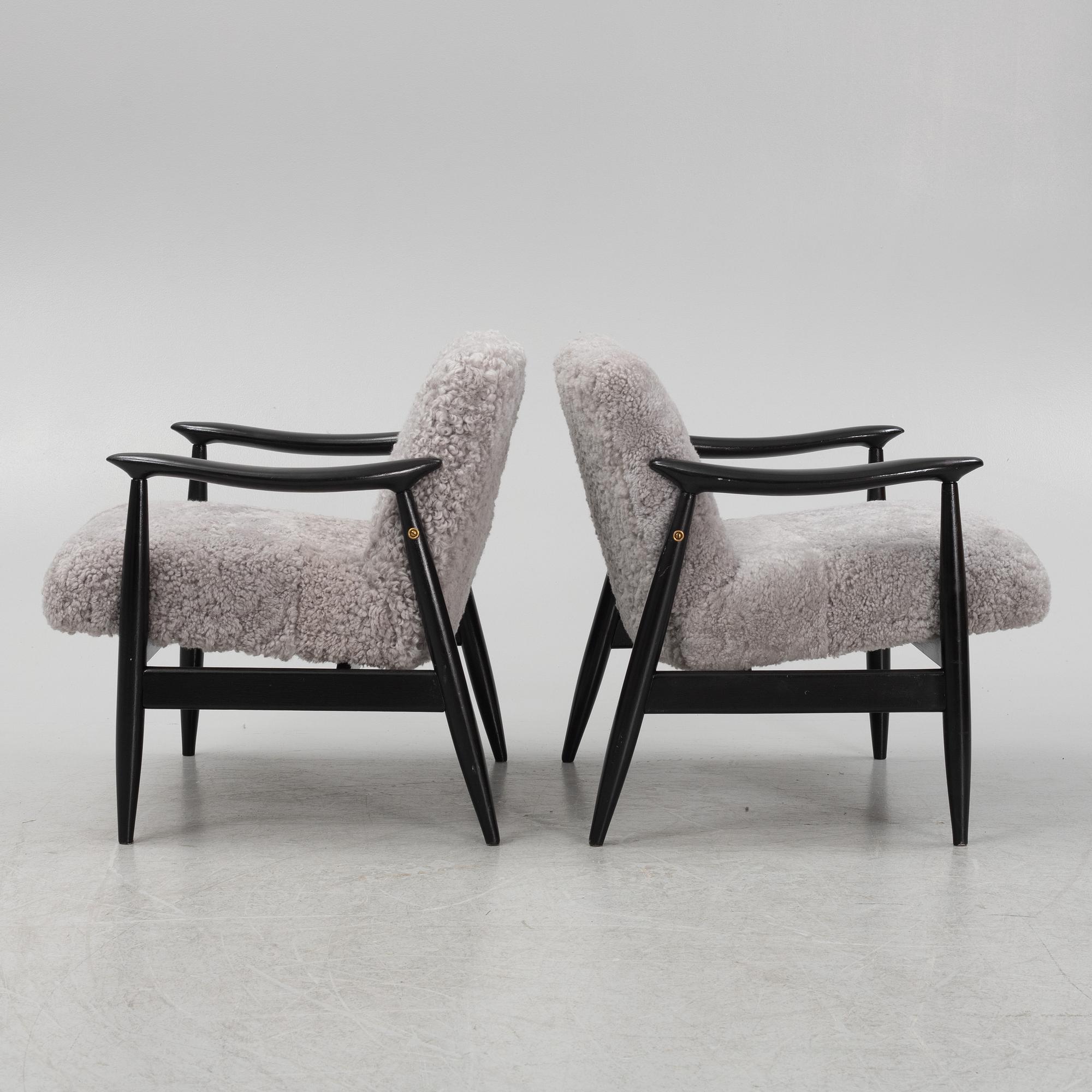 A pair of easy chairs, 1950's/60's.