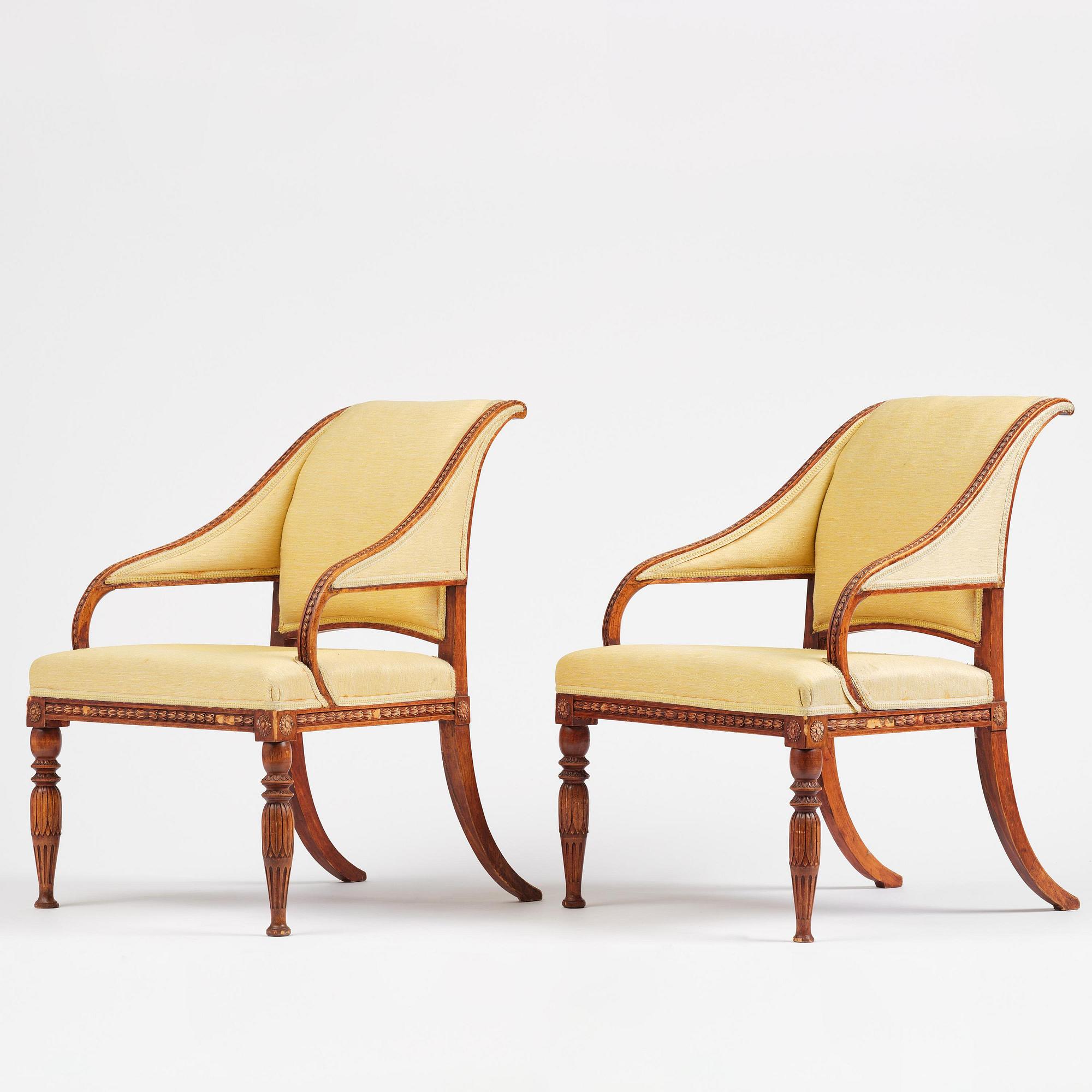 A pair of late gustavian armchairs in the manner of Ephraim Ståhl, Stockholm, circa 1800.