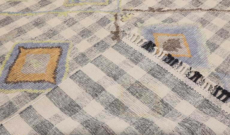 A kilim carpet with relief, 361 x 273 cm.