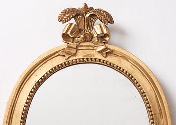 A pair of Gustavian two-light giltwood girandoles by J. Åkerblad (master 1756-1799).