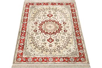 A carpet, Turkey, silk, c. 180 x 120 cm.