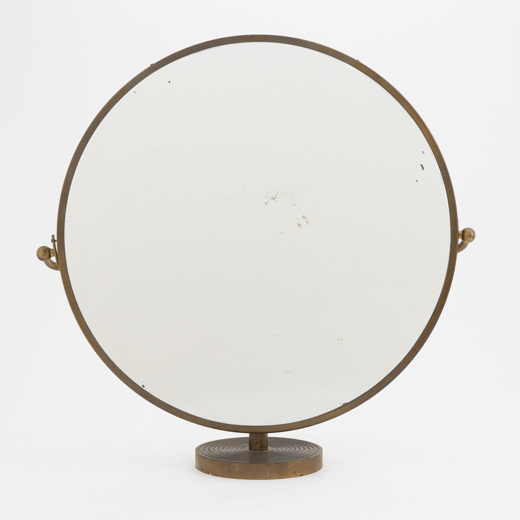 Josef Frank, a brass model '2214' table mirror, Firma Svenskt Tenn, Sweden.
