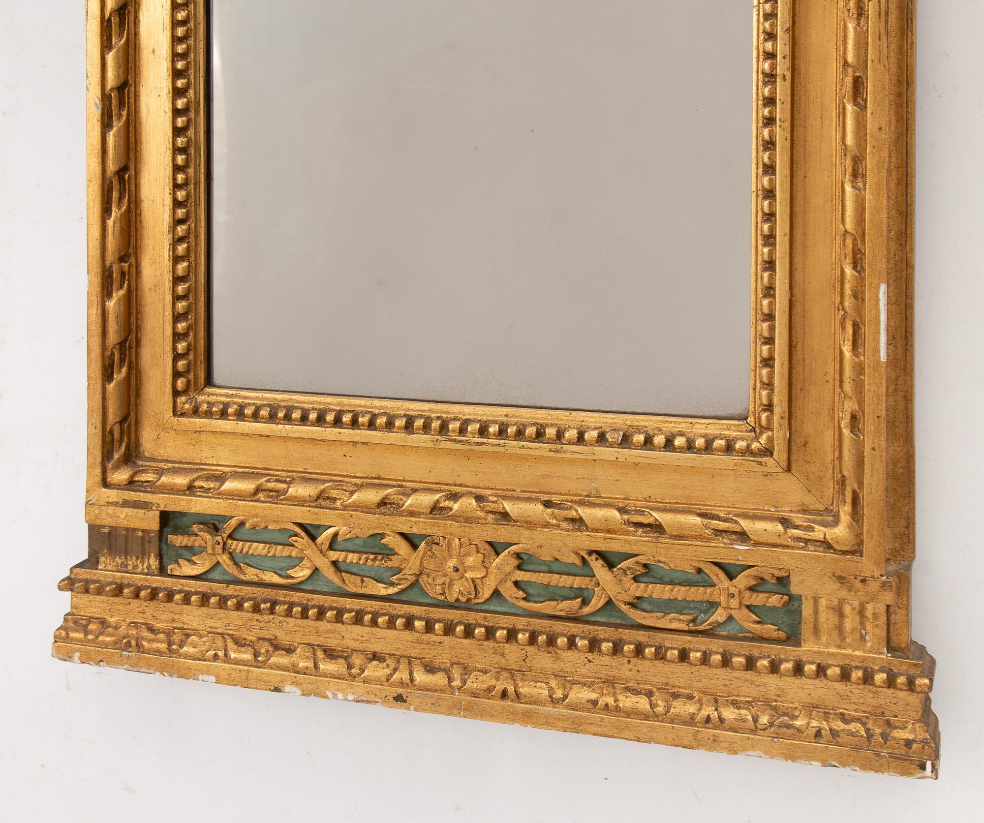 A late Gustavian mirror, late 18th Century.