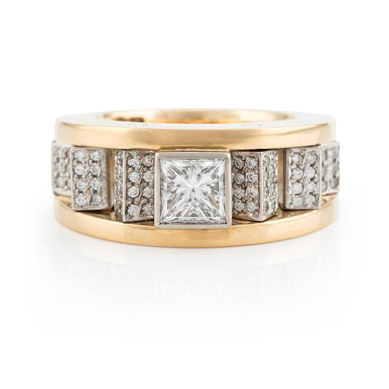 An 18K gold Gaudy ring with a princess-cut diamond.