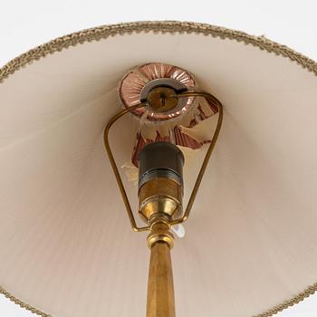Harald Notini, a Swedish Grace '6851' brass table light, Arvid Böhlmarks Lampfabrik, Stockholm, 1920's.