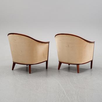 A pair of mahogany and velvet easy chairs by Bröderna Andersson, 1960's.
