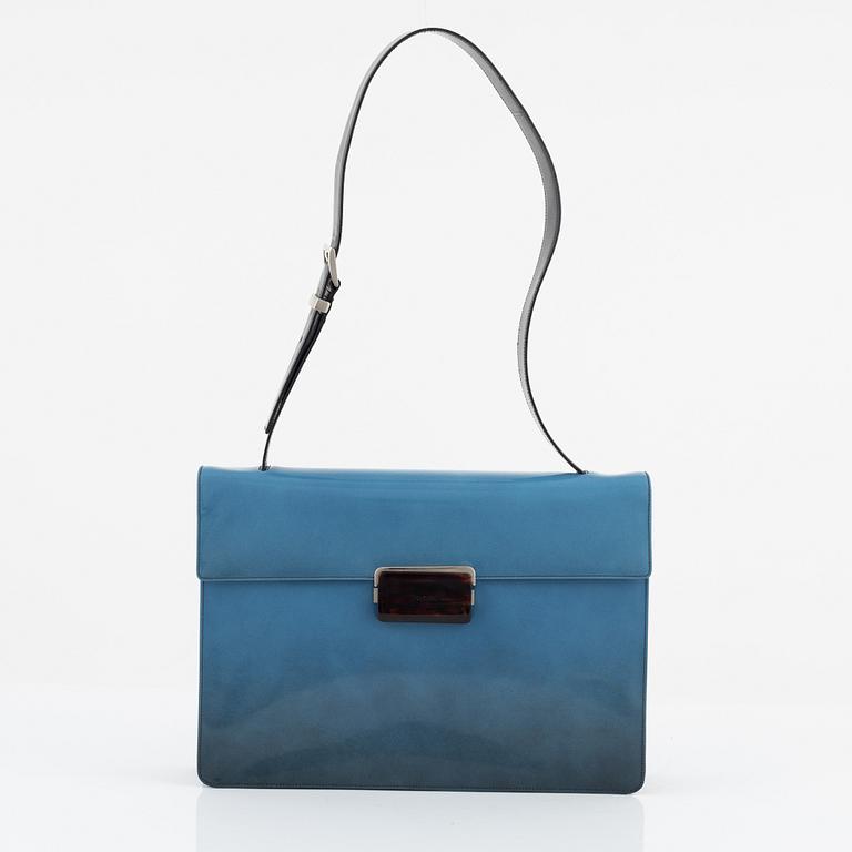 Prada, a blue patent leather bag.
