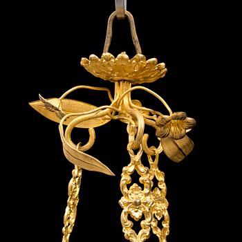 A late Empire gilt metal and glass chandelier, mid 19th Century.