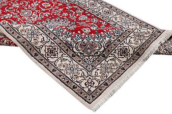 A Nain carpet, part silk, 9 laa, c. 303 x 198 cm.