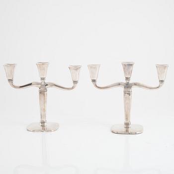 A pair of silver candlesticks, Swedish import marks, first half of the 20th Century.