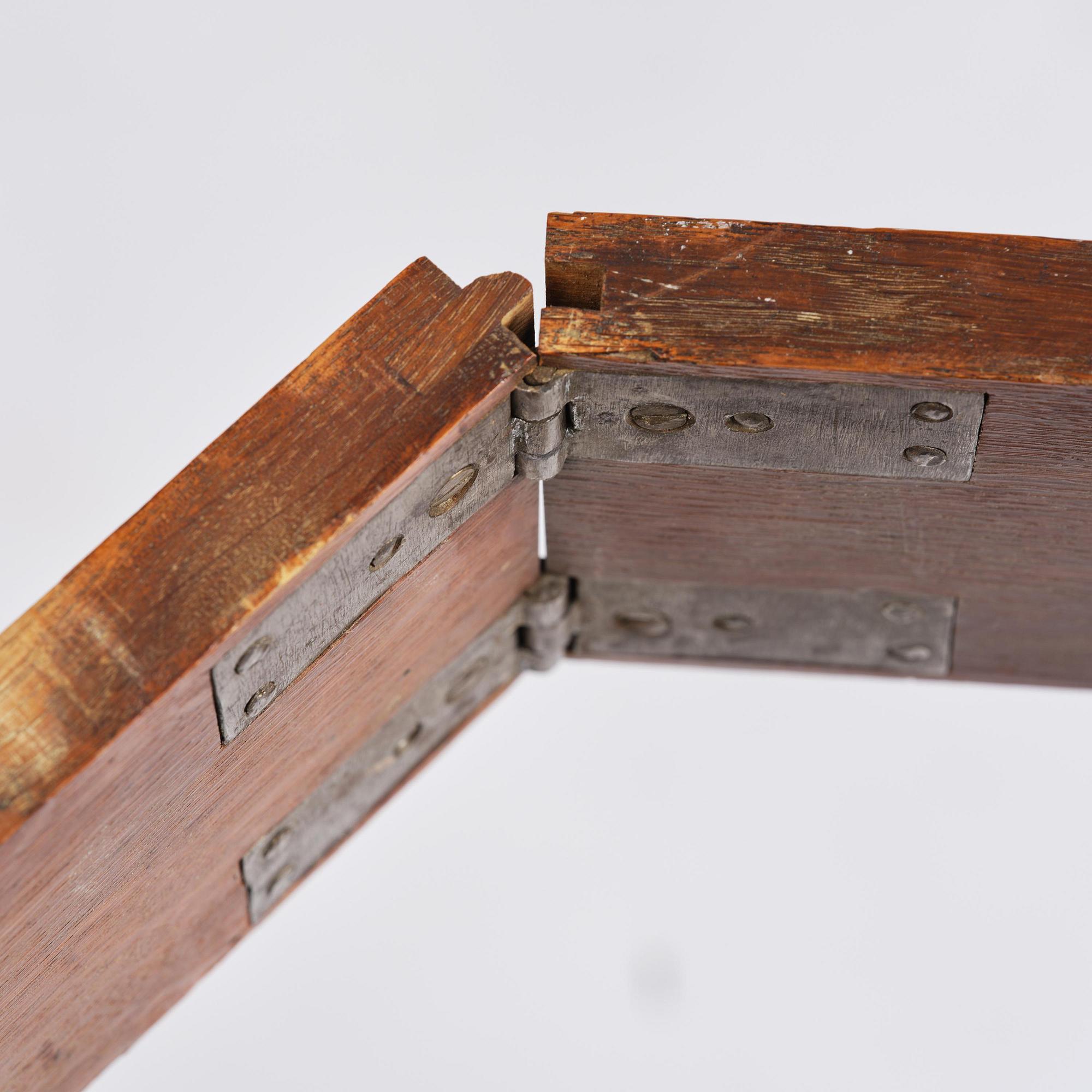 A Gustavian 'concertina action' mahogany games table by Georg Haupt (master in Stockholm 1770-84).