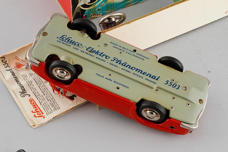 A Schuco toy car.