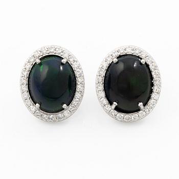 Earrings 18K white gold with opals and octagon-cut diamonds.