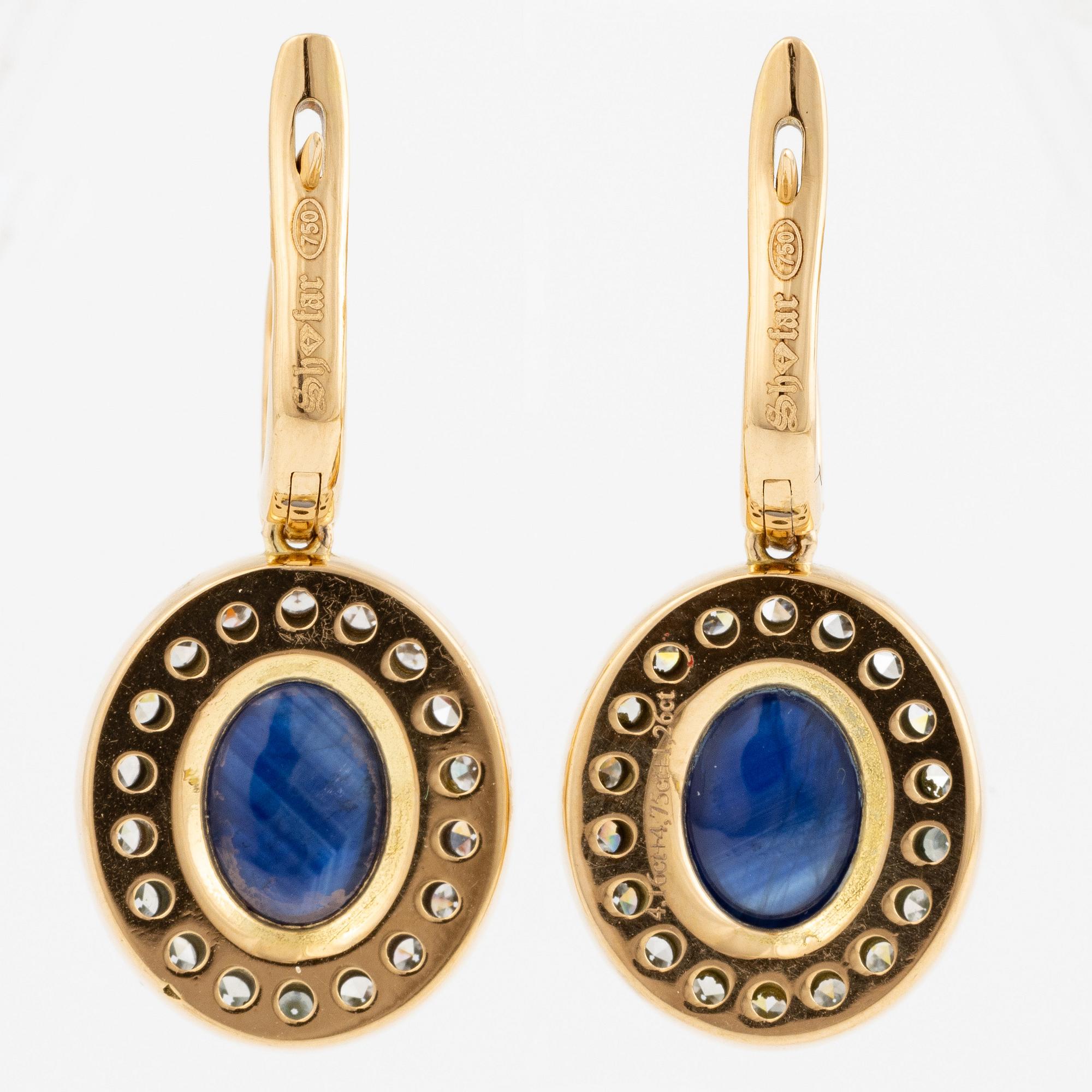 Earrings in 18K gold with cabochon-cut sapphires and octagon-cut diamonds.
