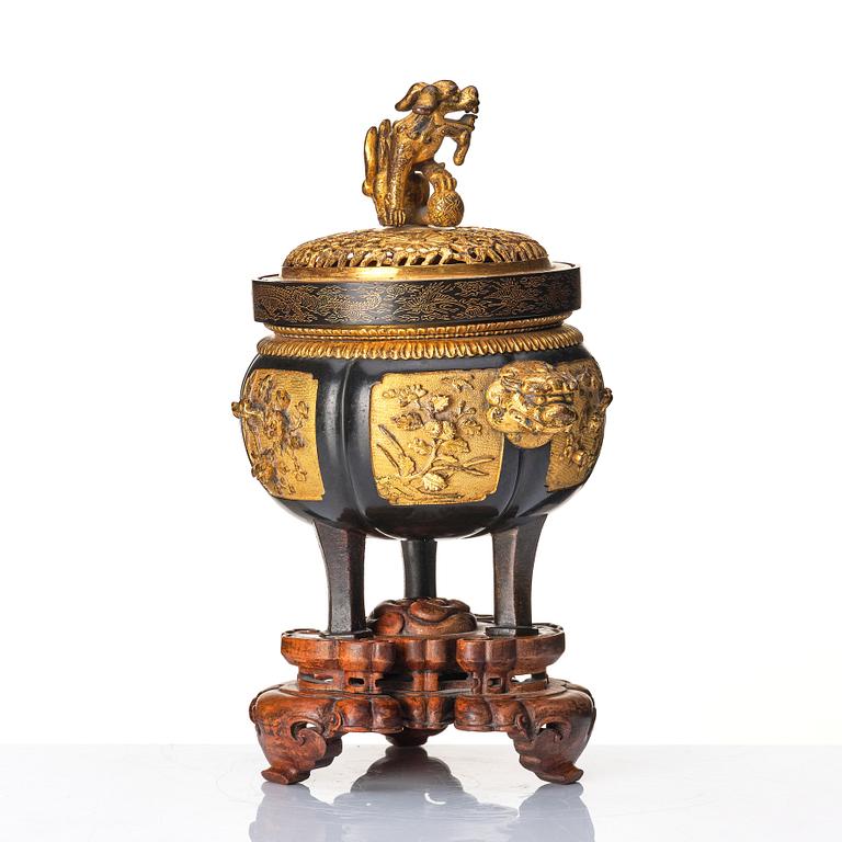 A gilt copper alloy censer with pierced cover, late Ming dynasty / early Qing dynasty.