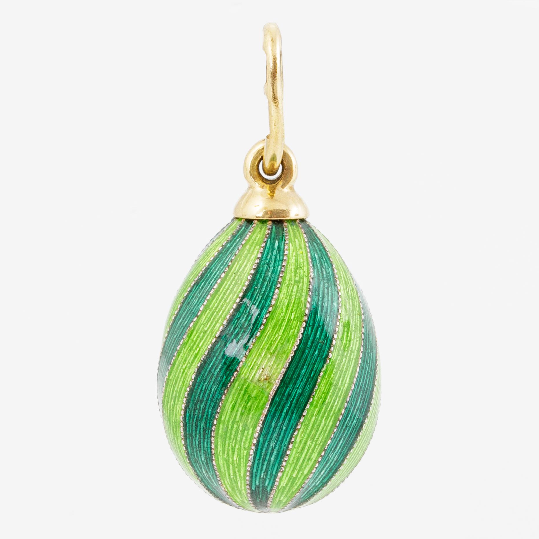 W.A. Bolin, pendant in the form of an egg, 18K gold and silver and enamel.