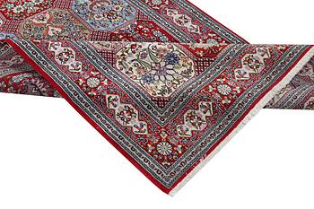 A Quum carpet, c. 250 x 150 cm.