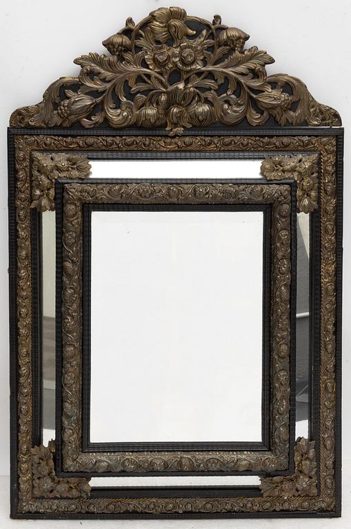 A Baroque style mirror, circa 1900.