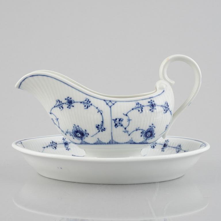 A 'Blue Fluted Plain' /'Musselmalet' sauce boat with stand, Royal Copenhagen, model 406 and 409, 1963 and 1893-1900.
