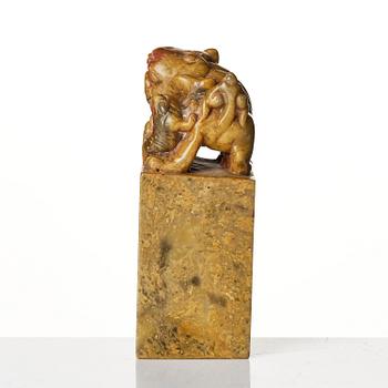 A group of four Chinese stone carvings.