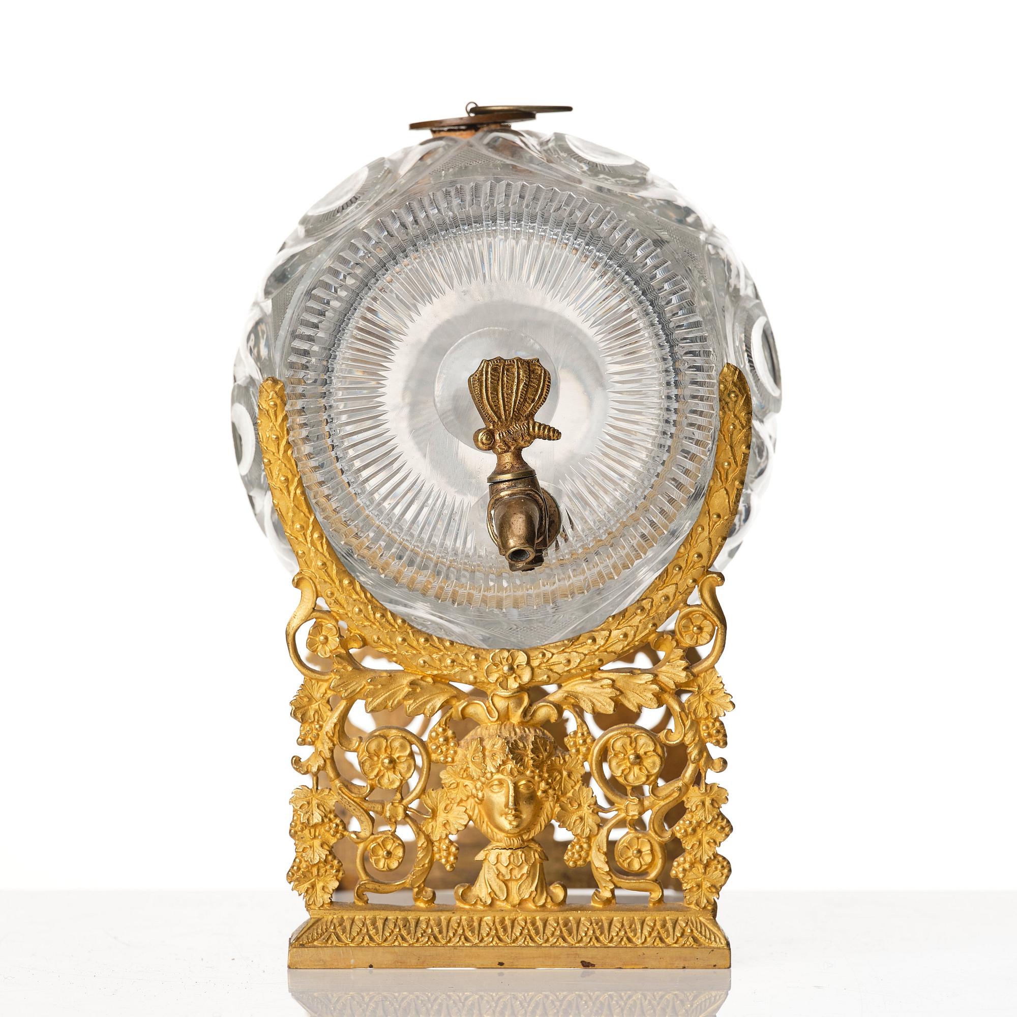 A Empire ormolu-mounted cut glass wine barrel.