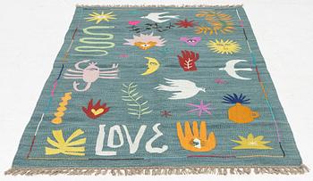 A hand-embroidered kilim rug, c. 179 x 124 cm.