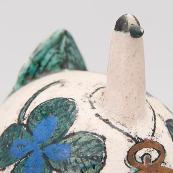 A ceramic bird signed Kaipiainen.