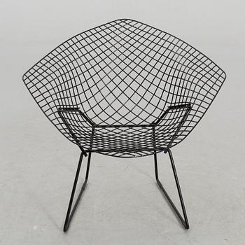 A HARRY BERTOIA "DIAMOND CHAIR".