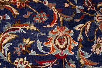 An oriental carpet, c. 390 x 295 cm.