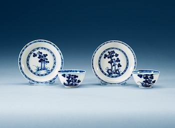 1699. A pair of blue and white tea cups with stands, Qing dynasty, Qianlong (1736-95).