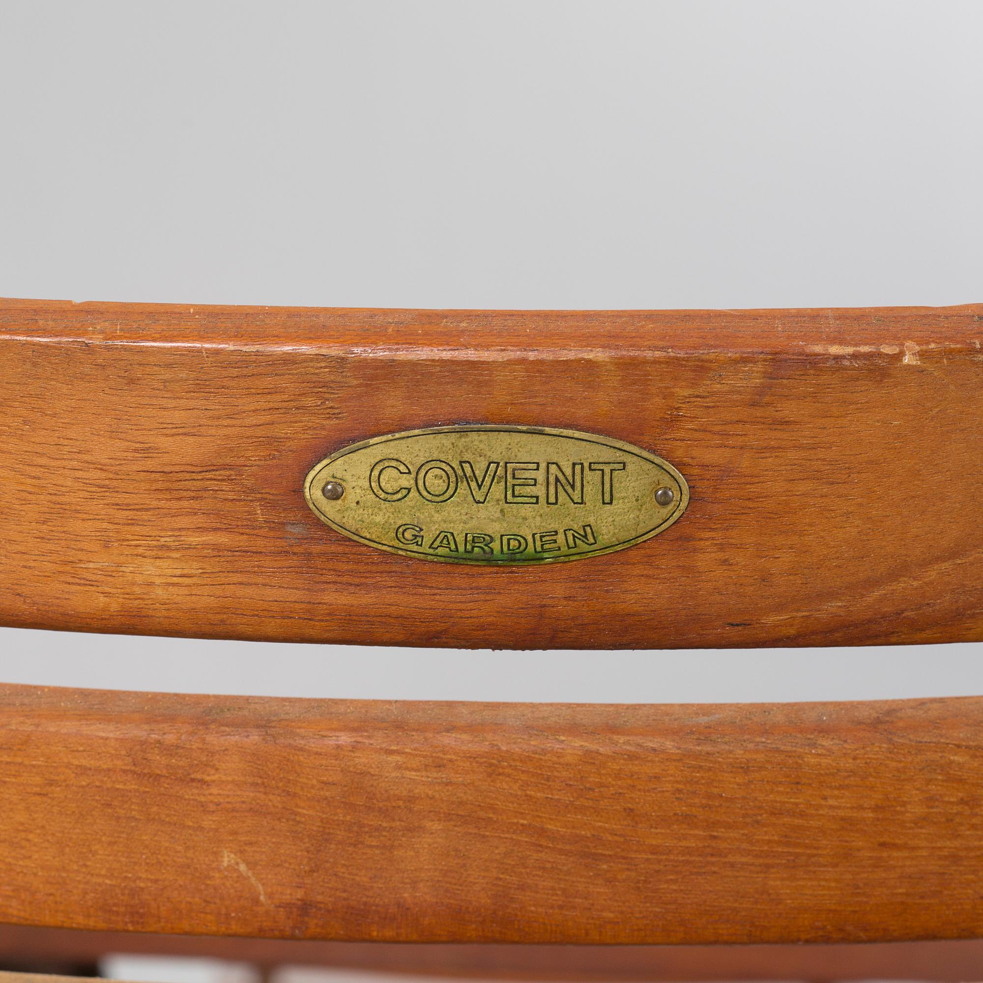 A garden table and four garden chairs from Covent Garden, 21th century.