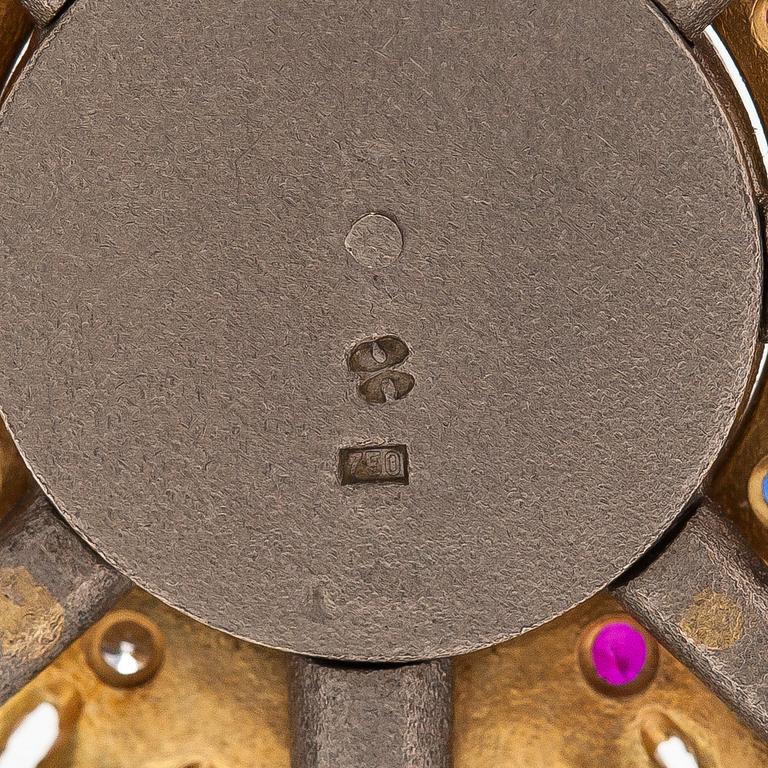 Pendant, faceted sapphires, rubies and diamonds, iron ore, 18K gold and white gold.