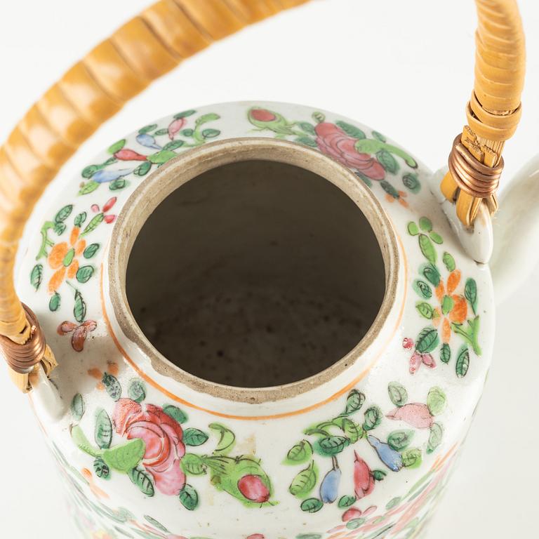 A Canton porcelain teapot and cup with saucer, China, 20th century.