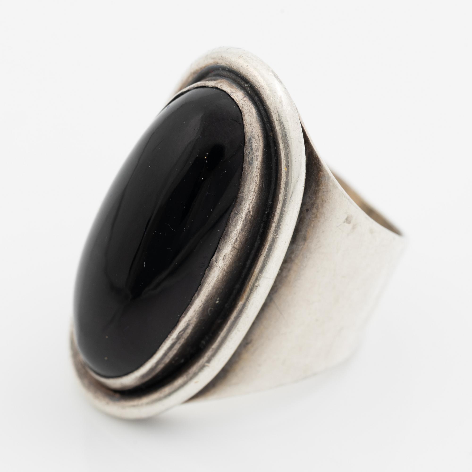 Ring, Carl Ove Frydensberg, silver with cabochon-cut black stone, Denmark.