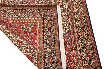 A Ghom rug, c. 202 x 137 cm.
