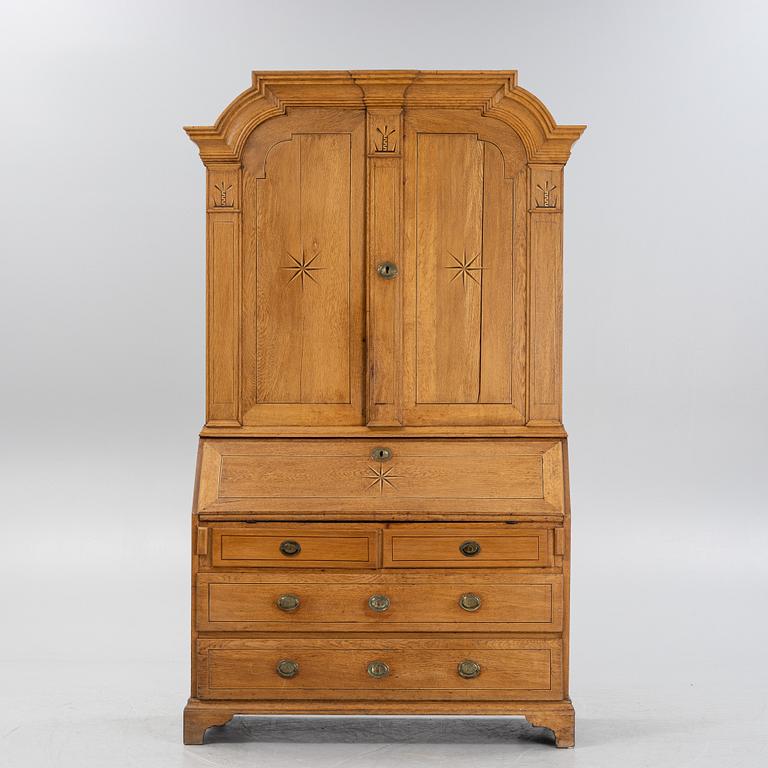 A late Baroque writing cupboard, mid 18th century. Possably Småland, Sweden.