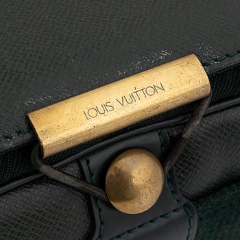 Louis Vuitton, a green taiga 'Abbesses' bag, 1998.