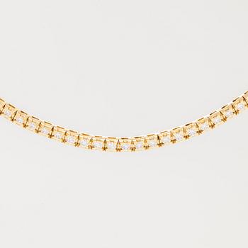 An 18K brilliant-cut diamond rivieré necklace. Corvino, Italy.